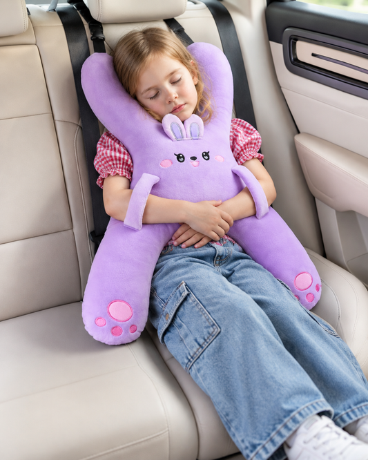 Girl sleeping in the car with the purple bunny Nanalu travel pillow